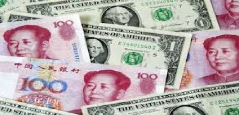 انخفاض قيمة اليوان أمام الدولار
